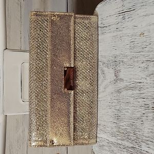 Jimmy Choo gold glitter clutch